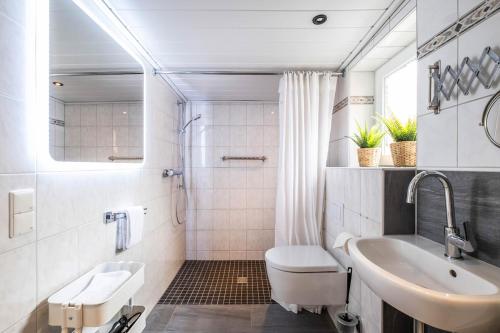 Ένα μπάνιο στο Ferienhaus Abbie