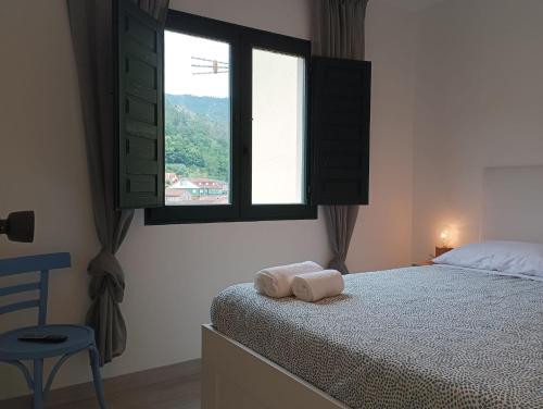 Ένα ή περισσότερα κρεβάτια σε δωμάτιο στο Casa dos avós
