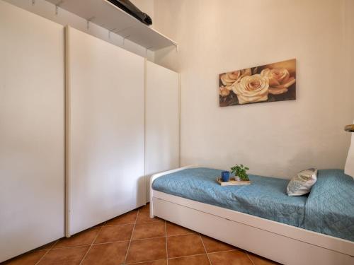 Katil atau katil-katil dalam bilik di Holiday Home Capriccioli B by Interhome