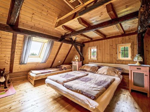 Postel nebo postele na pokoji v ubytování Holiday Home Jizerka by Interhome