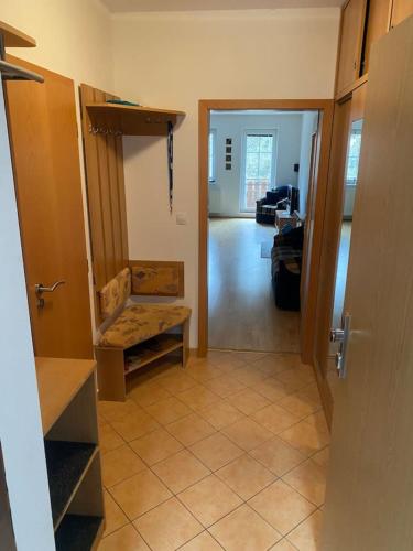 a room with a hallway with a room with at Apartmán pod Prokopem in Železná Ruda