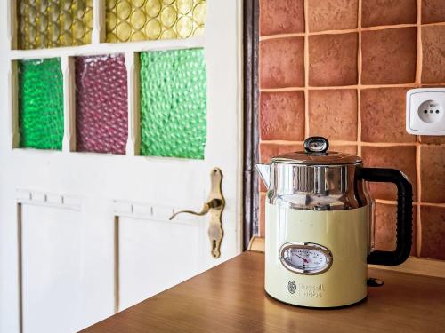 a blender sitting on a counter in a kitchen at Holiday Home U sjezdovky by Interhome in Smržovka