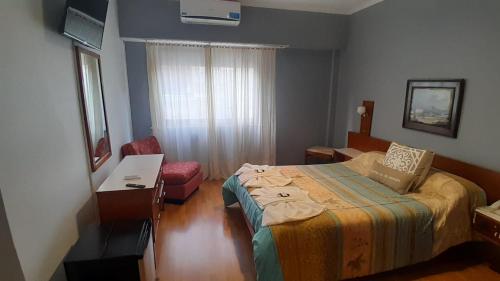 Letto o letti in una camera di Hotel Perugia