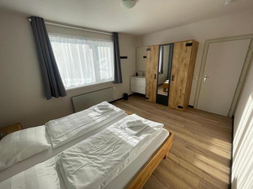 Postel nebo postele na pokoji v ubytování Haus Sonnenstrahl
