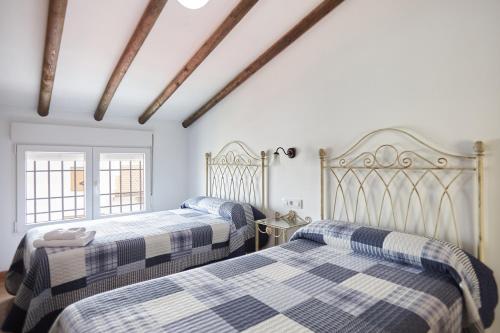 Ένα ή περισσότερα κρεβάτια σε δωμάτιο στο Casa Calera