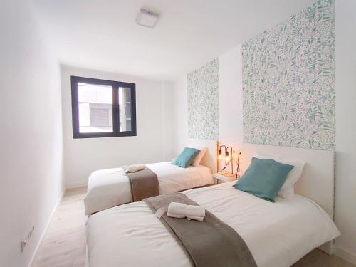 En eller flere senge i et værelse på El Retiro