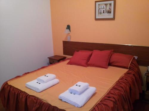 Katil atau katil-katil dalam bilik di Hotel Terrazas del Rincon
