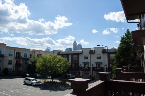 a view of a parking lot with buildings at Uptown CLT - Modern Townhouse in Charlotte