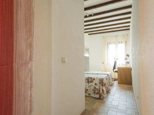 Postel nebo postele na pokoji v ubytování Apartment Podere Sant'Elisa-1 by Interhome