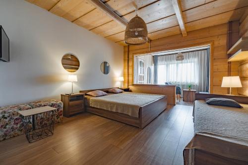 Postel nebo postele na pokoji v ubytování Willa owca czarna