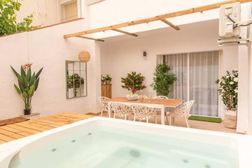 Foto Casa para 8 personas con jardin 1