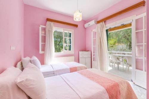 Postel nebo postele na pokoji v ubytování The Green Cottage 2