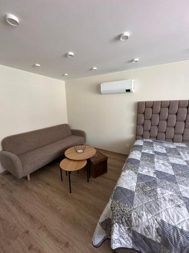 Postel nebo postele na pokoji v ubytování G&G Apartments in Nida