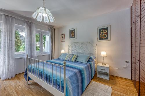 Posteľ alebo postele v izbe v ubytovaní Apartment Dragica