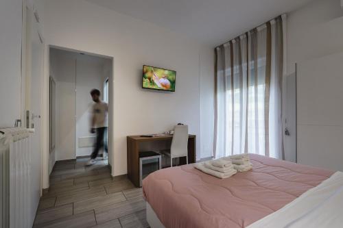 Katil atau katil-katil dalam bilik di Zaro Suites B&B