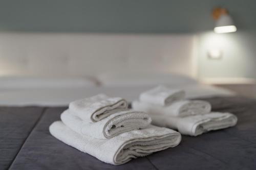 Katil atau katil-katil dalam bilik di Zaro Suites B&B