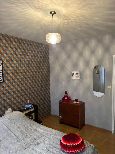 Ένα ή περισσότερα κρεβάτια σε δωμάτιο στο Gîte LA MAISON ROSE