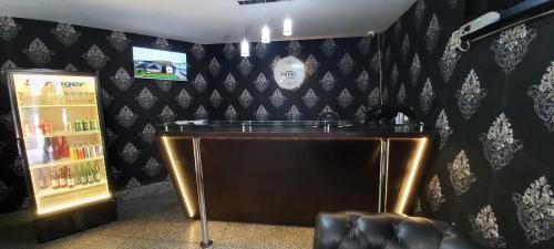 TV a/nebo společenská místnost v ubytování Lourdes Prime Hotel - Fácil Acesso Savassi