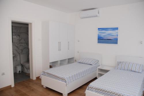 Postel nebo postele na pokoji v ubytování Castello