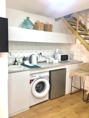 Kitchen o kitchenette sa apartment gr