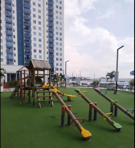 a playground with a bunch of play equipment at Apartamento NUEVO, moderno e inteligente in Ibagué