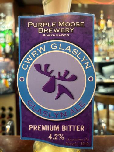 a sign for a grape mouse brewery of yawn glassalam butter at Aleppo Merchant Inn in Carno