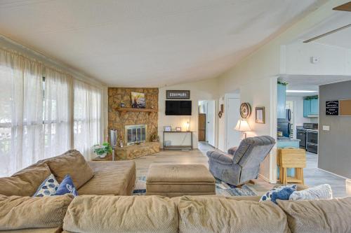 a living room with a couch and two chairs at Lakefront Gun Barrel City Home with Dock and Deck in Gun Barrel City