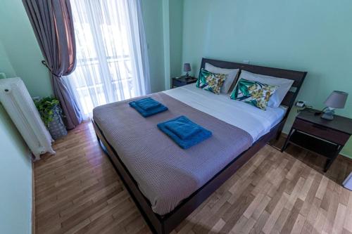 Ένα ή περισσότερα κρεβάτια σε δωμάτιο στο Flower