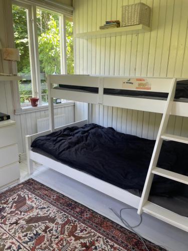 Postel nebo postele na pokoji v ubytování Hus i Mölle