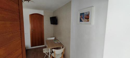 TV a/nebo společenská místnost v ubytování Estudio en el centro de Conil