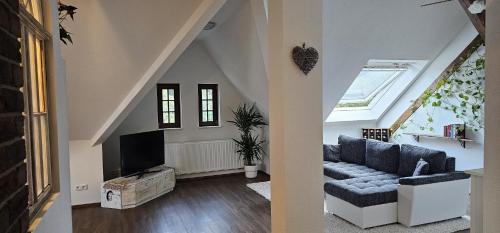 Χώρος καθιστικού στο SeenSucht & Urlaubsträume, Ferienwohnung "Strand-Romantik"