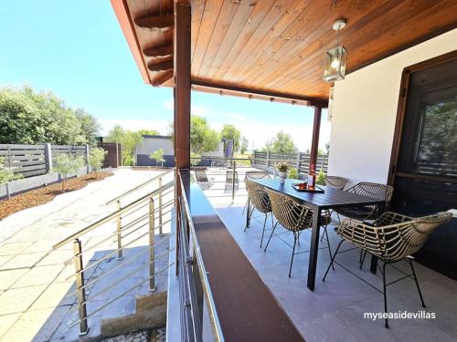 Summertime Villa just 90meters from the sea!