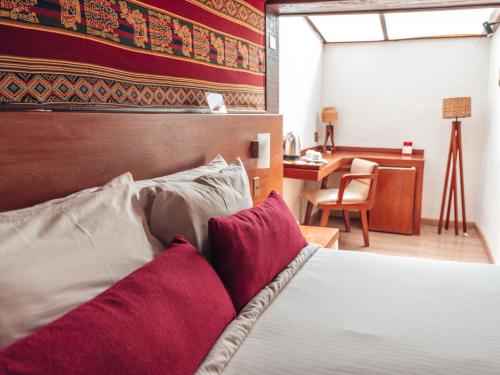 Postel nebo postele na pokoji v ubytování Hotel Palacio de Sal