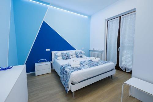 Ένα ή περισσότερα κρεβάτια σε δωμάτιο στο Casa Vacanze ClaEli