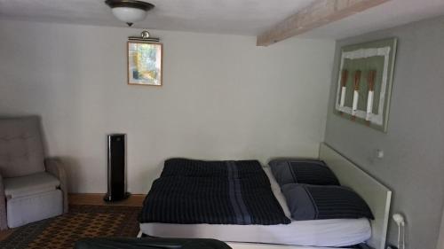 Giường trong phòng chung tại Apartmenthaus mit Sauna und Whirlpool