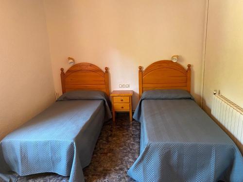 Postel nebo postele na pokoji v ubytování Hotel Rural Cal Amadeu