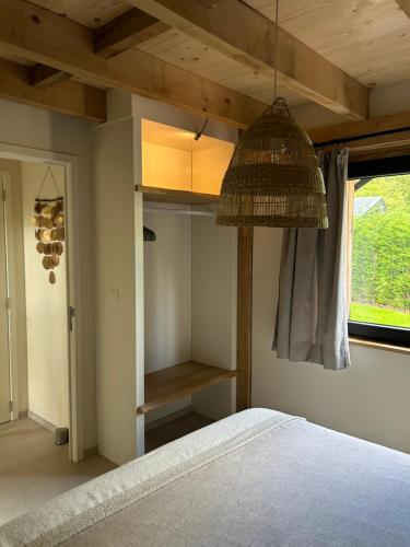 Postel nebo postele na pokoji v ubytování Chalet Hoge Kempen