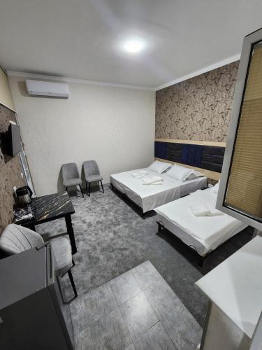 Ένα ή περισσότερα κρεβάτια σε δωμάτιο στο Room4you