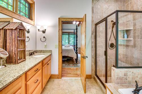 a bathroom with a shower and a sink at Luxe Trillium Home with Fire Pit, 5 Mi to Cashiers in Cullowhee