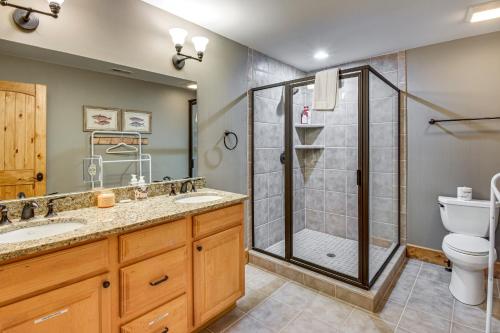 a bathroom with a shower and a toilet at Luxe Trillium Home with Fire Pit, 5 Mi to Cashiers in Cullowhee