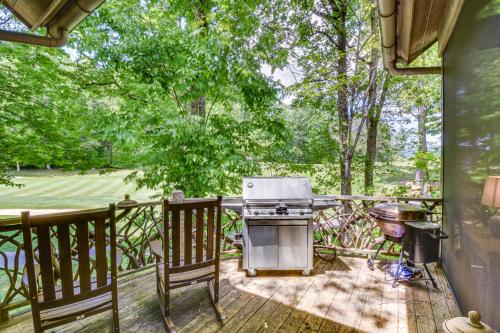 a patio with a grill and a grill at Luxe Trillium Home with Fire Pit, 5 Mi to Cashiers in Cullowhee