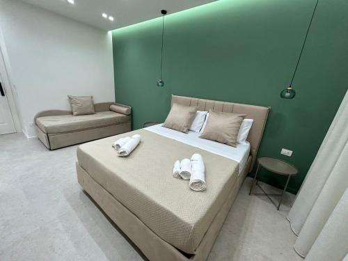 Un pat sau paturi într-o cameră la B&B Le Origini