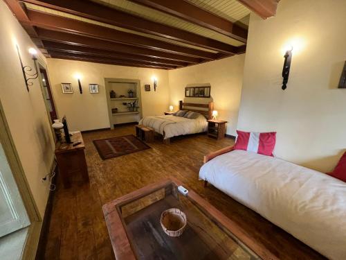 an overhead view of a bedroom with two beds at CASONA SAN PEDRO Hotel Boutique in San Javier