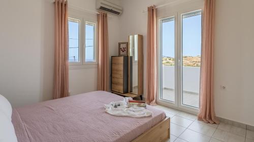 Ένα ή περισσότερα κρεβάτια σε δωμάτιο στο Alkyonis Visus House