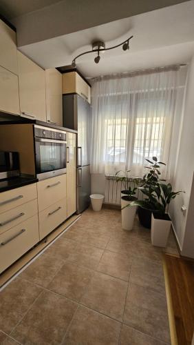ครัวหรือมุมครัวของ S&S Centre Apartment