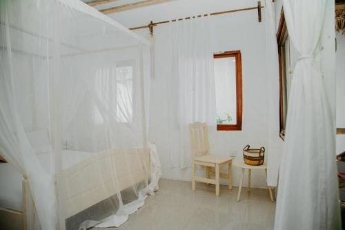 Letto o letti in una camera di Ocean Boho House