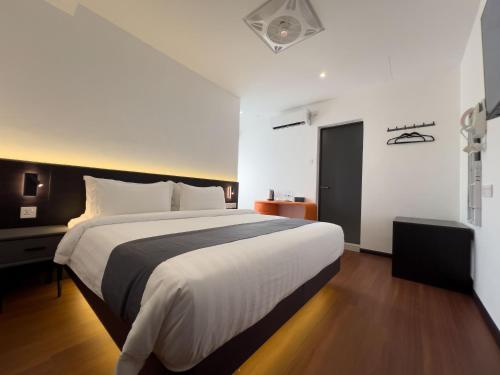 Katil atau katil-katil dalam bilik di Asia Premium Hotel Kuala Terengganu