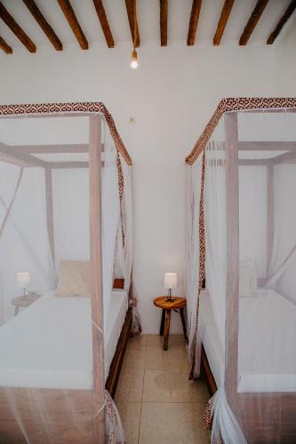 Letto o letti in una camera di Ocean Boho House