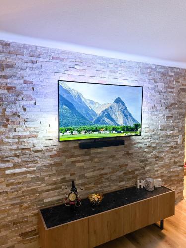 Appartement moderne et spacieux avec 2 belles terrasses vu sur montagne