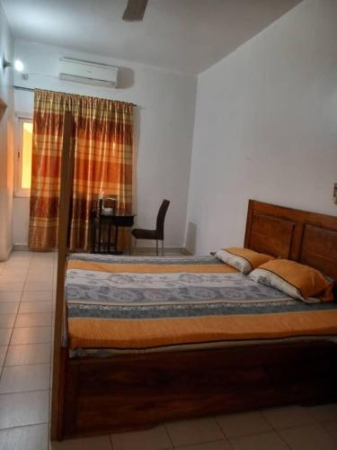 Postel nebo postele na pokoji v ubytování Appartement dans le quartier ACI à Bamako avec panneaux solaires